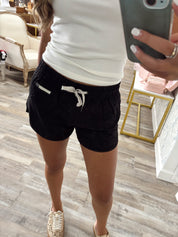 Soft woven lined athletic shorts with zipper coin pocket
