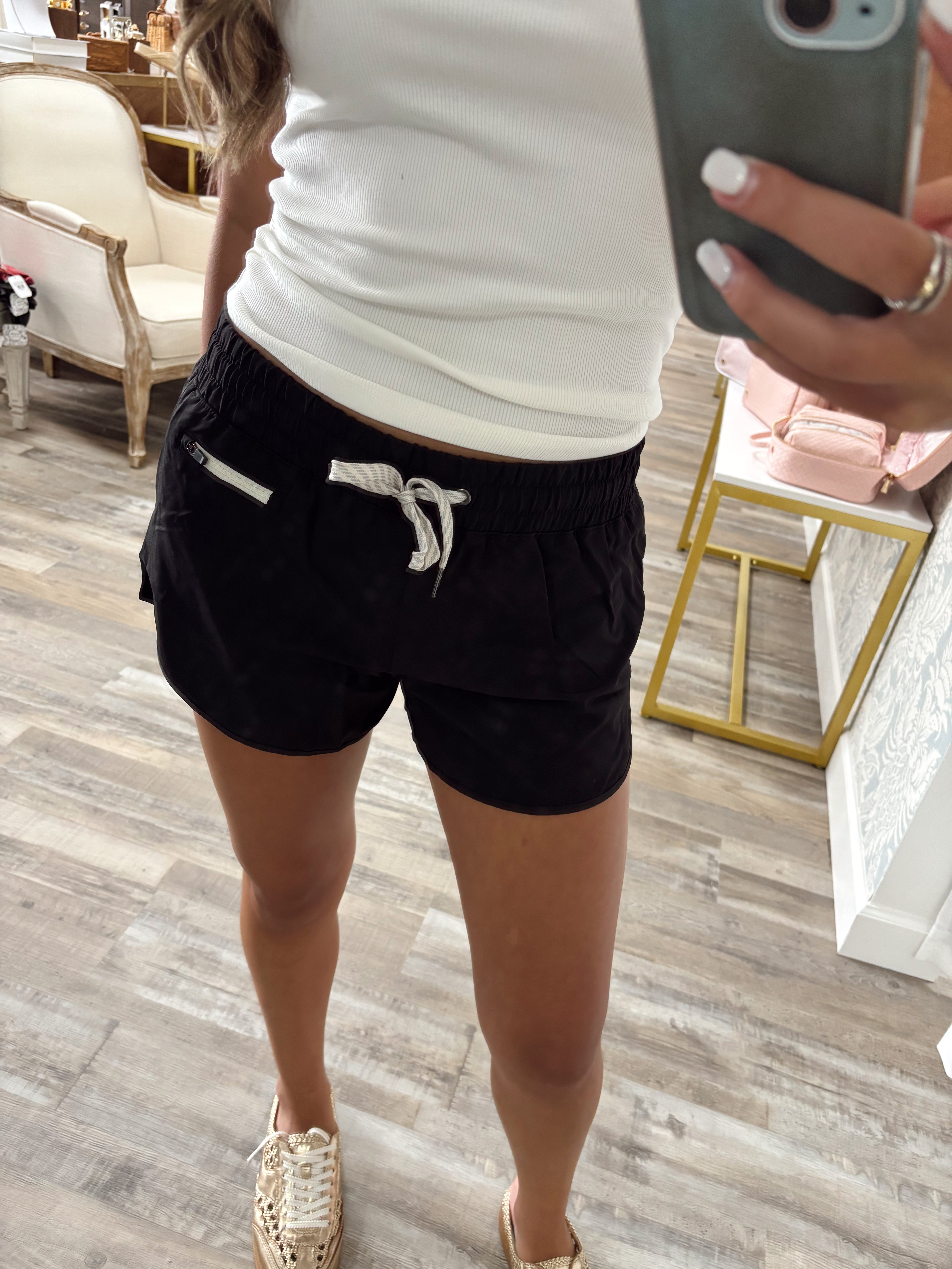 Soft woven lined athletic shorts with zipper coin pocket