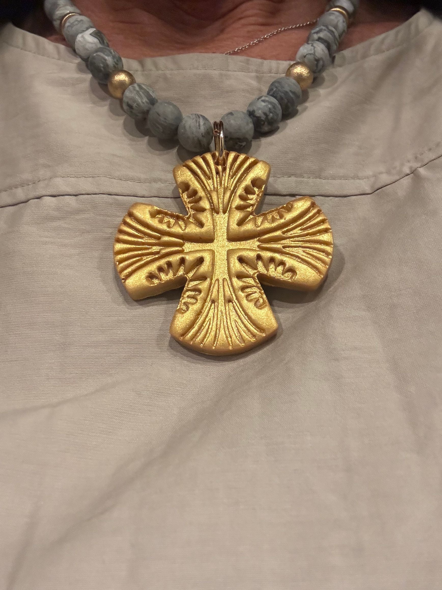 Hidden Truth Grey/Gold Cross Necklace