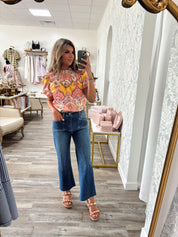 Peach floral ruffled neck top