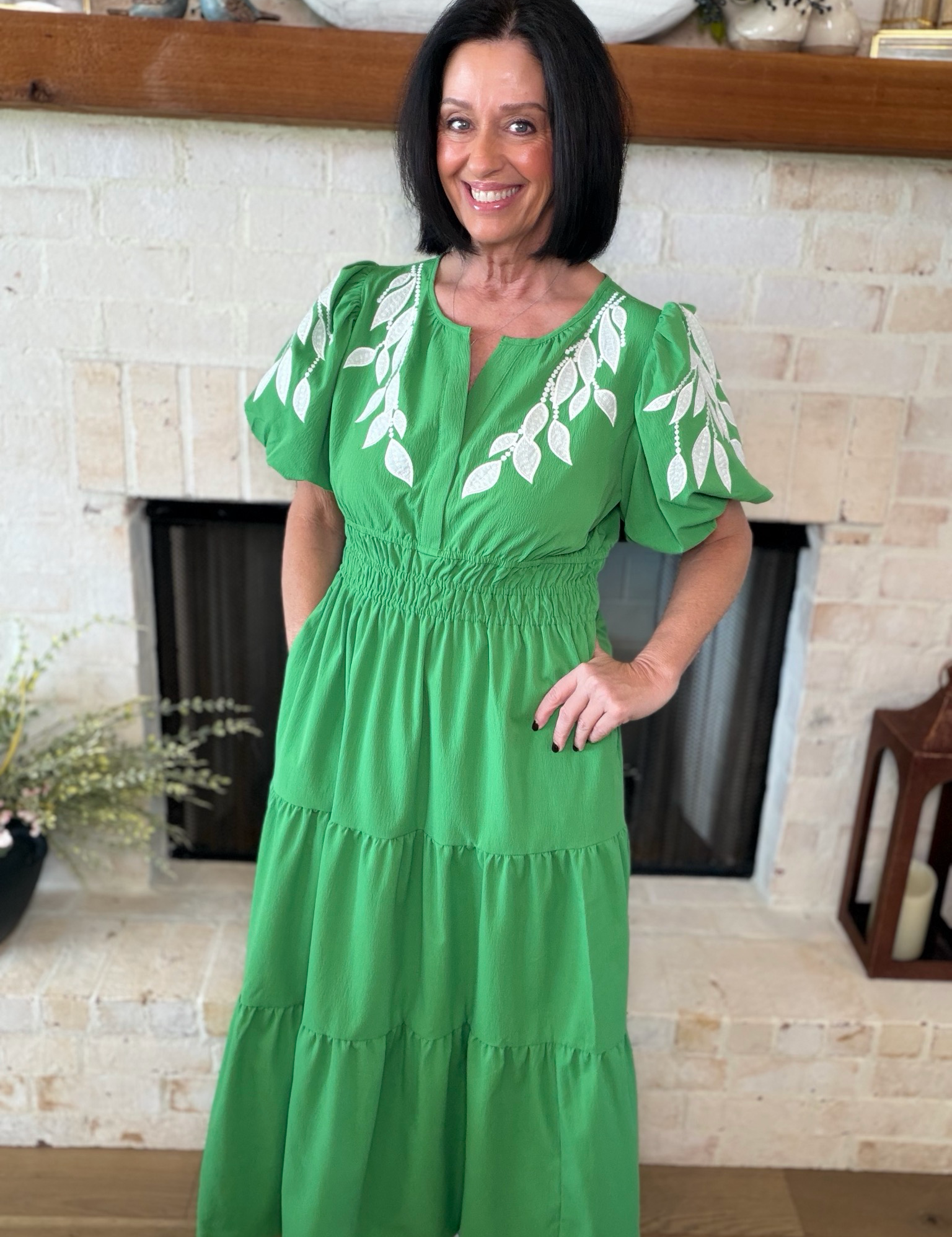 Green Maxi Dress With Floral Accents On Sleeves
