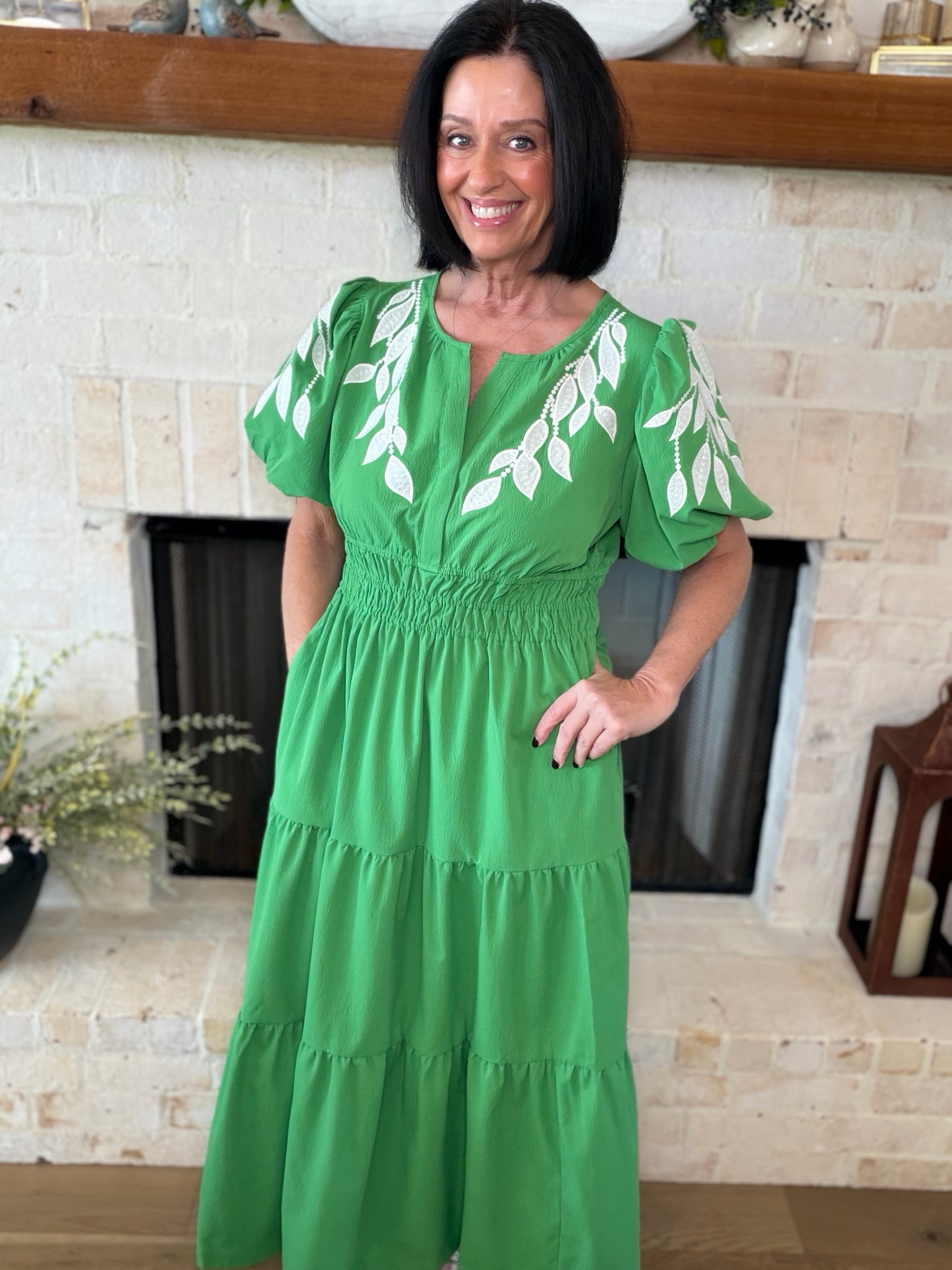 Green Maxi Dress With Floral Accents On Sleeves