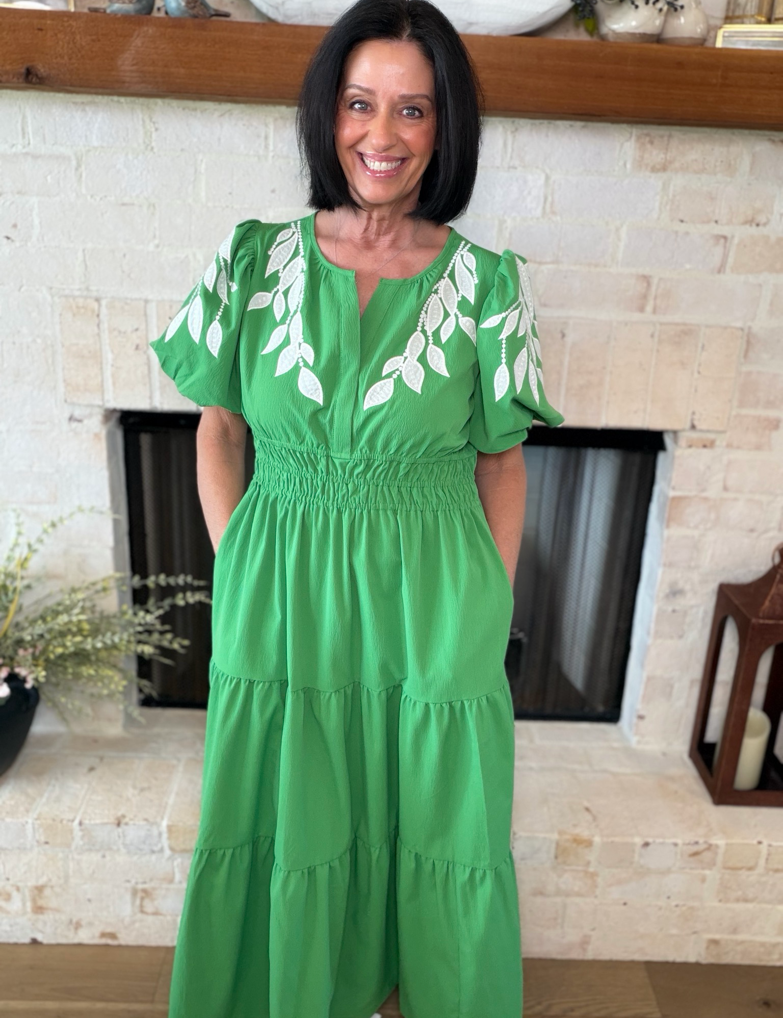 Green Maxi Dress With Floral Accents On Sleeves