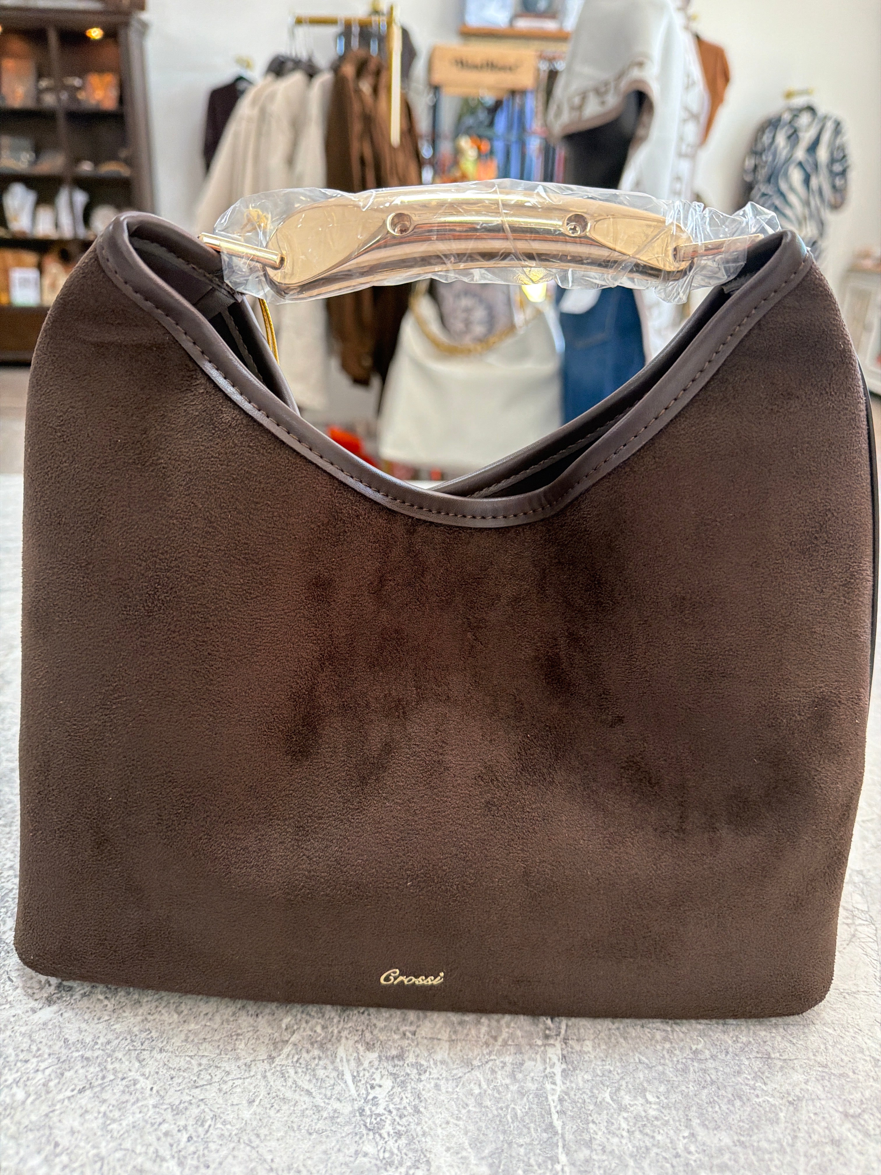 Brown suede bag with gold studs