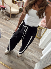 Windbreaker pants with white stripe