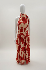 Pale peach/orange print halter neckline maxi dress